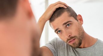 Comprendre la calvitie masculine causes, symptômes et traitements